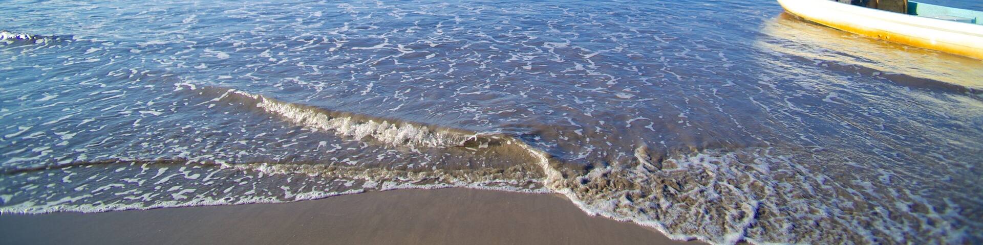 Linda Beach which includes landscape views and a sandy beach