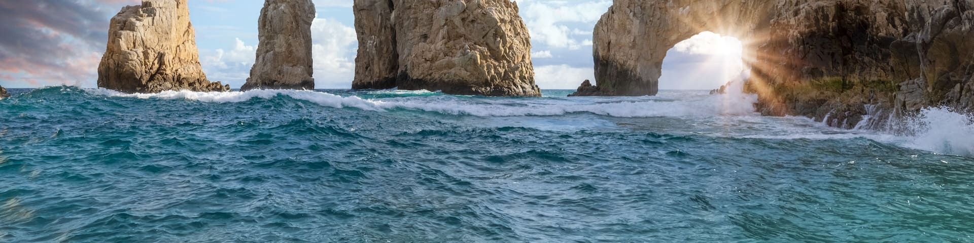 Scenic landmark tourist destination Arch of Cabo San Lucas, El Arco, whale watching and snorkeling spot.