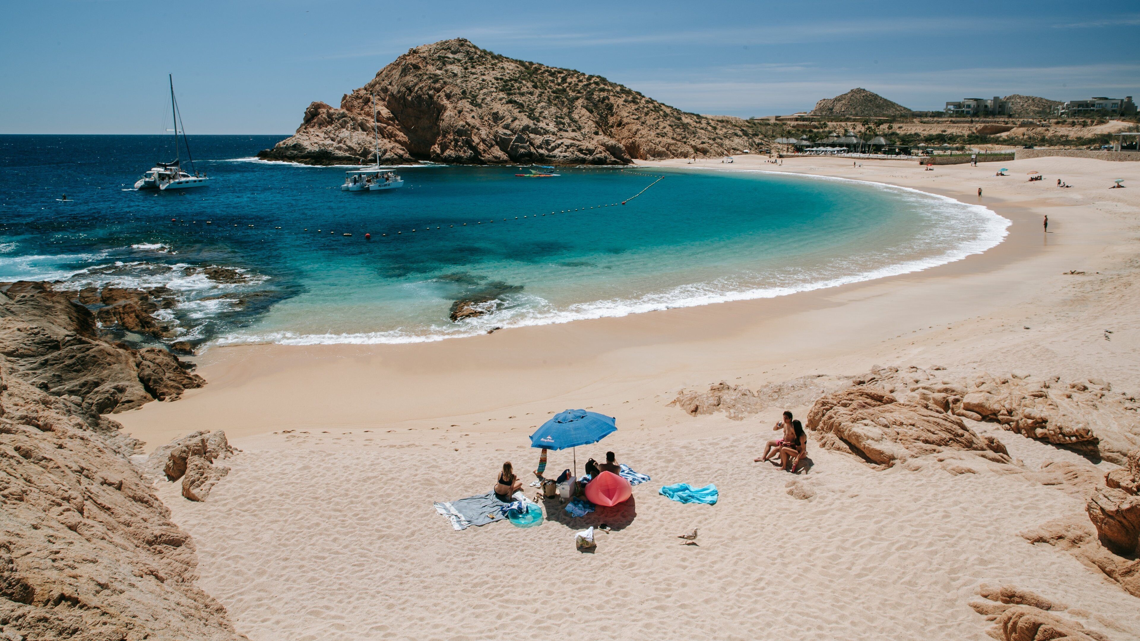Santa Maria Beach featuring rocky coastline, general coastal views and a beach