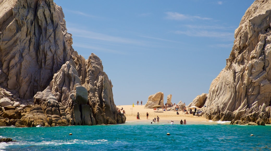 Playa del Amor showing general coastal views and rocky coastline