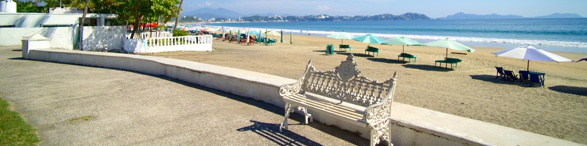 Playa Miramar which includes general coastal views and a beach