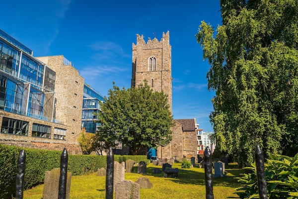 St. Michan\'s Church featuring a cemetery, a church or cathedral and heritage architecture