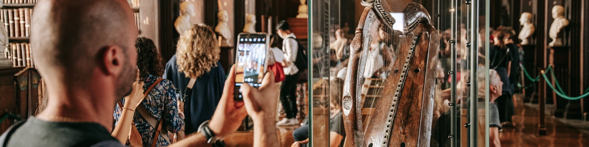 The Book of Kells featuring heritage elements and interior views as well as an individual male