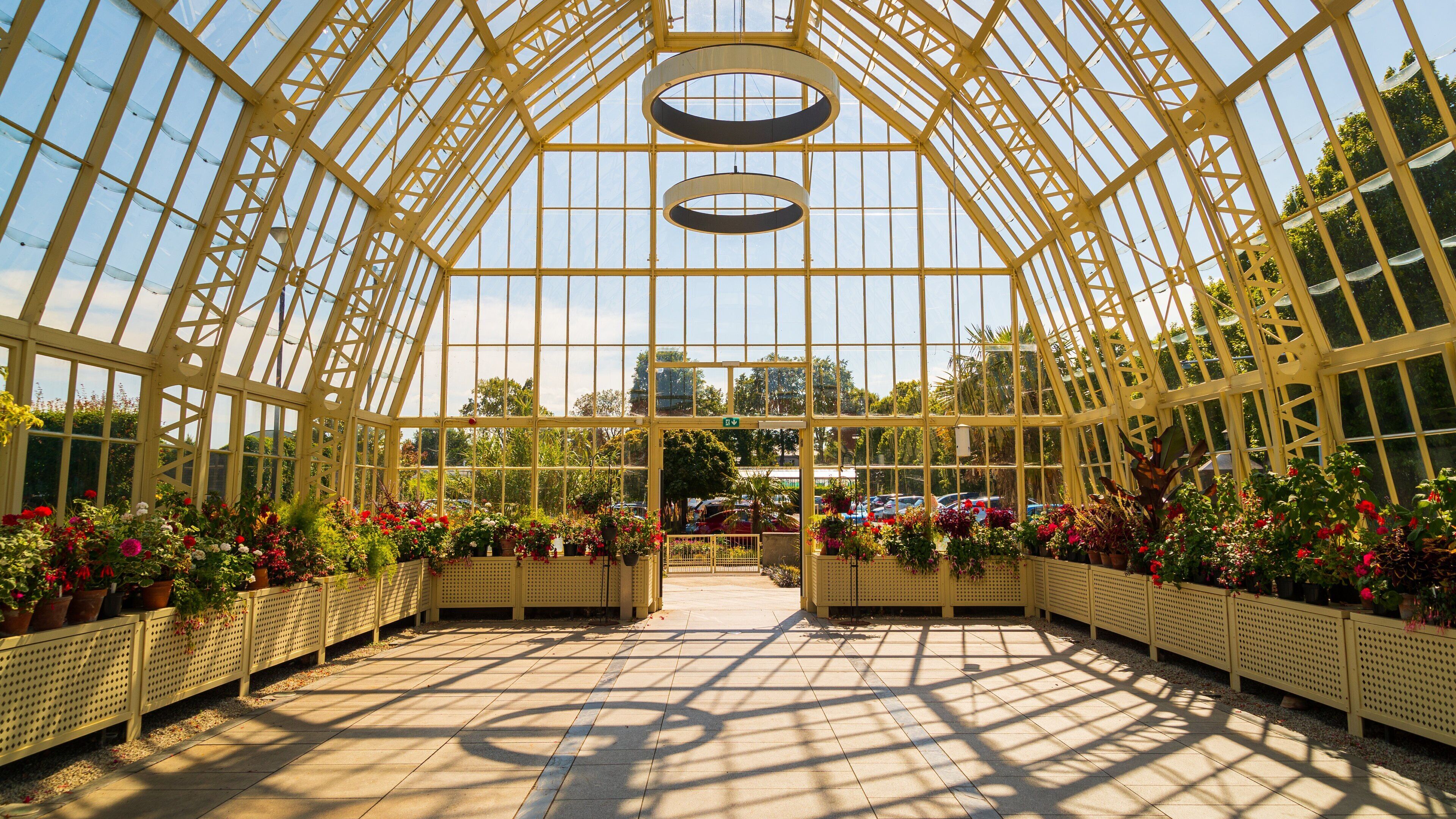 National Botanic Gardens showing flowers, a park and interior views