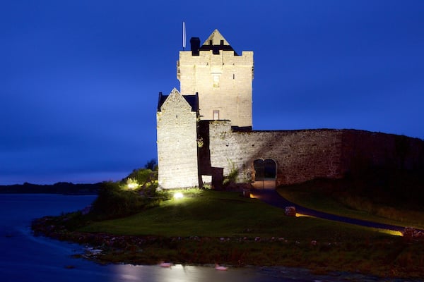 Dunguaire Castle which includes heritage architecture, a river or creek and château or palace