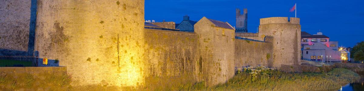 King John\'s Castle showing heritage architecture, a river or creek and heritage elements