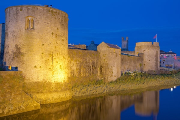 King John\'s Castle showing heritage architecture, a river or creek and heritage elements