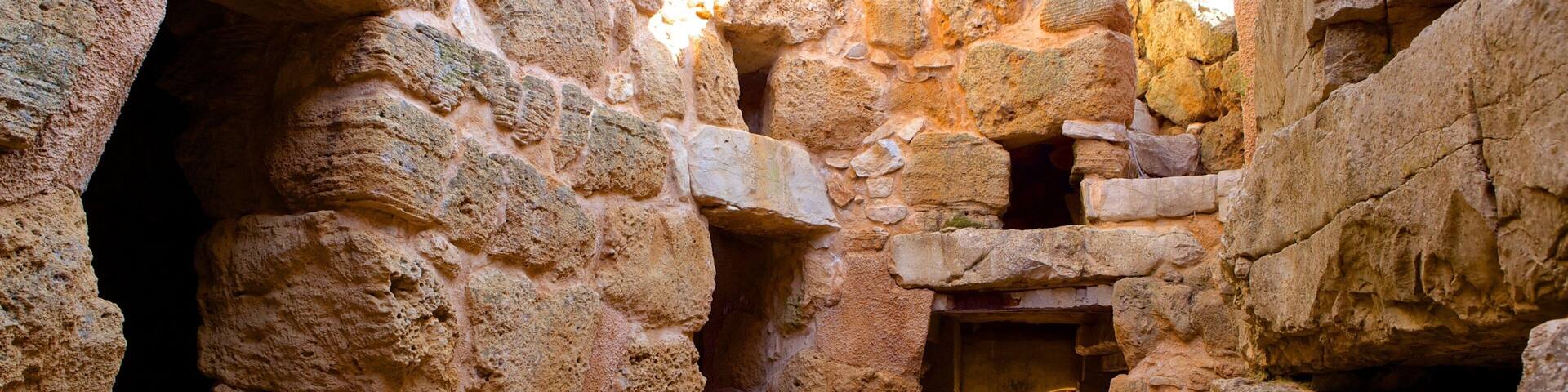 Nuraghe di Palmavera which includes a ruin