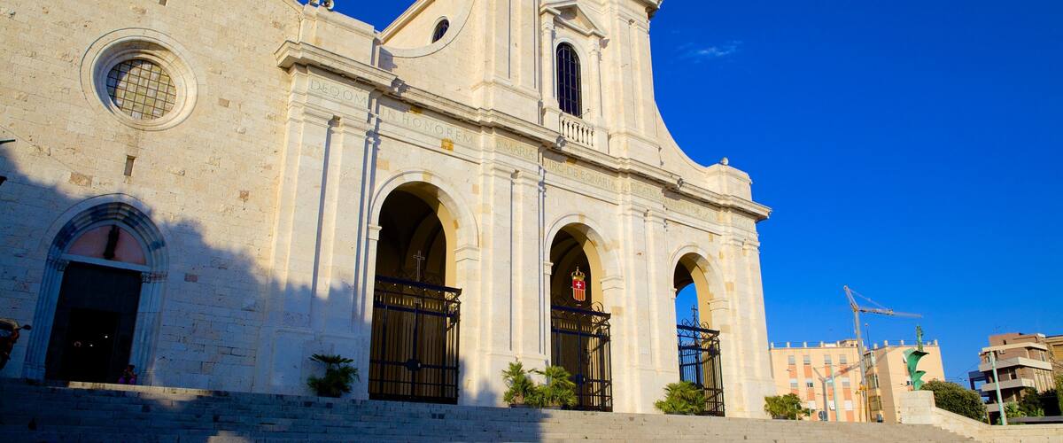 Sanctuary of Our Lady of Bonaria which includes a church or cathedral, religious elements and heritage architecture