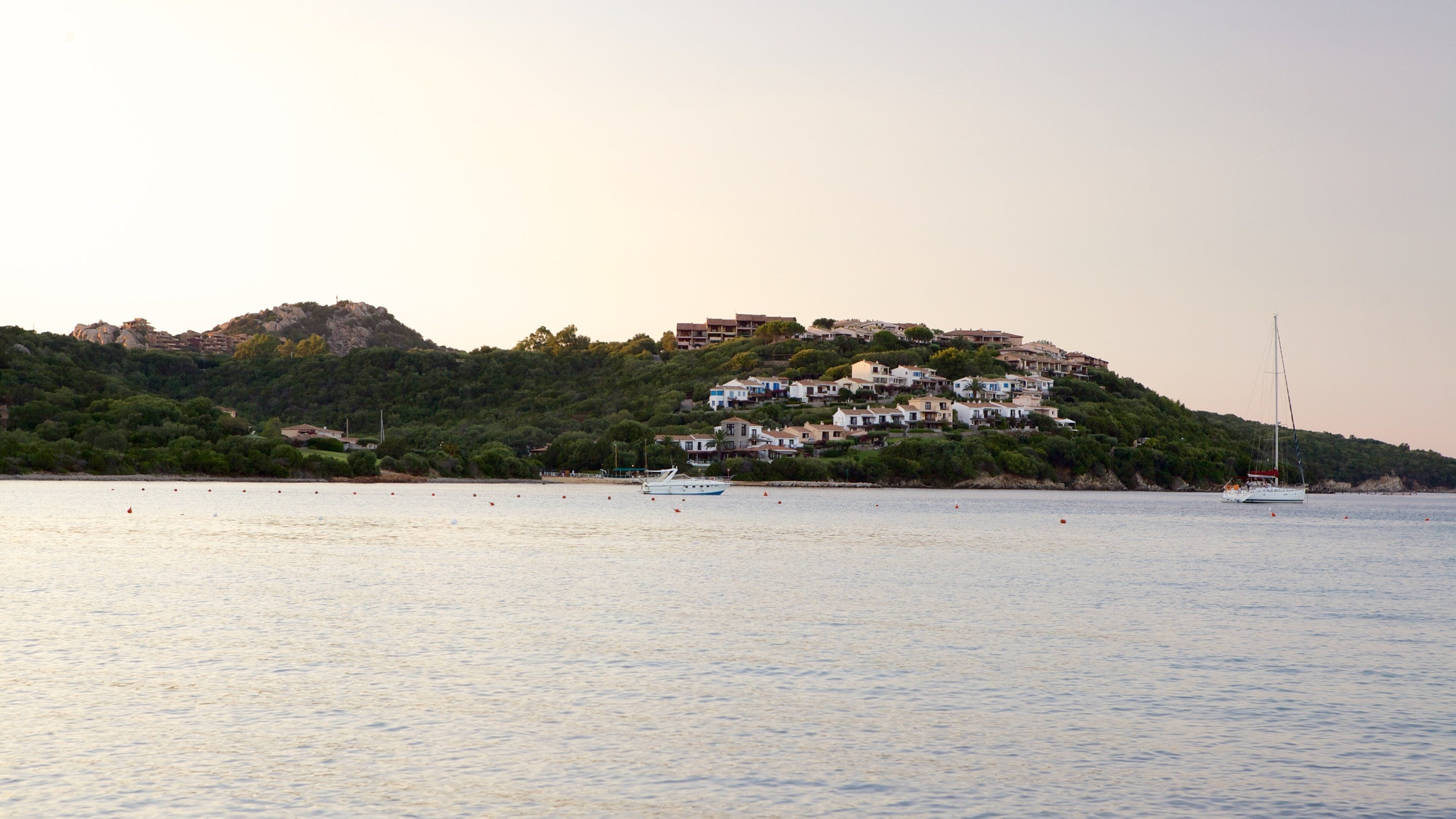 La Marinella Beach featuring boating, general coastal views and a coastal town