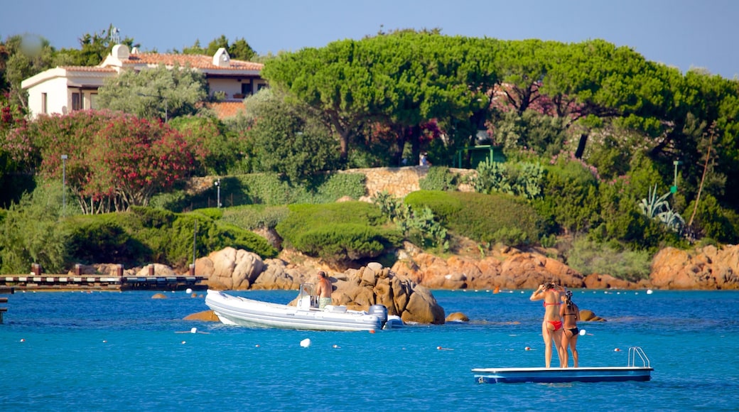 Romazzino Beach showing rugged coastline