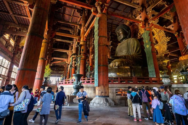Todaiji Temple featuring interior views, heritage elements and a temple or place of worship