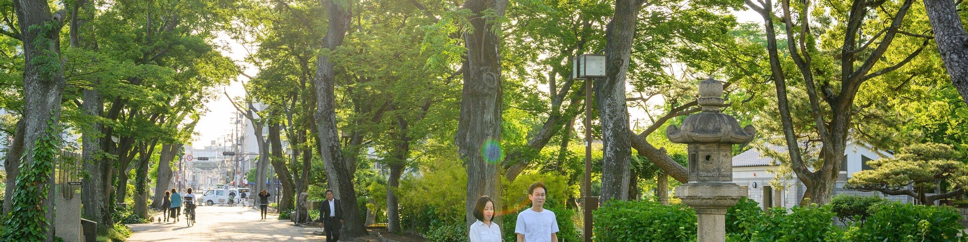 Sumiyoshi Park showing a park and a sunset as well as a couple