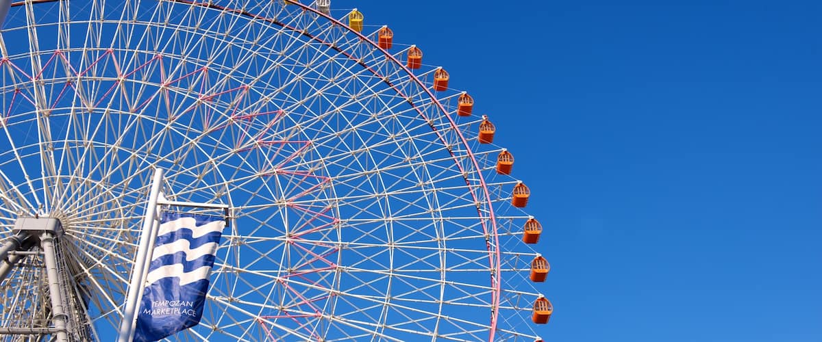 Tempozan Giant Ferris Wheel which includes rides