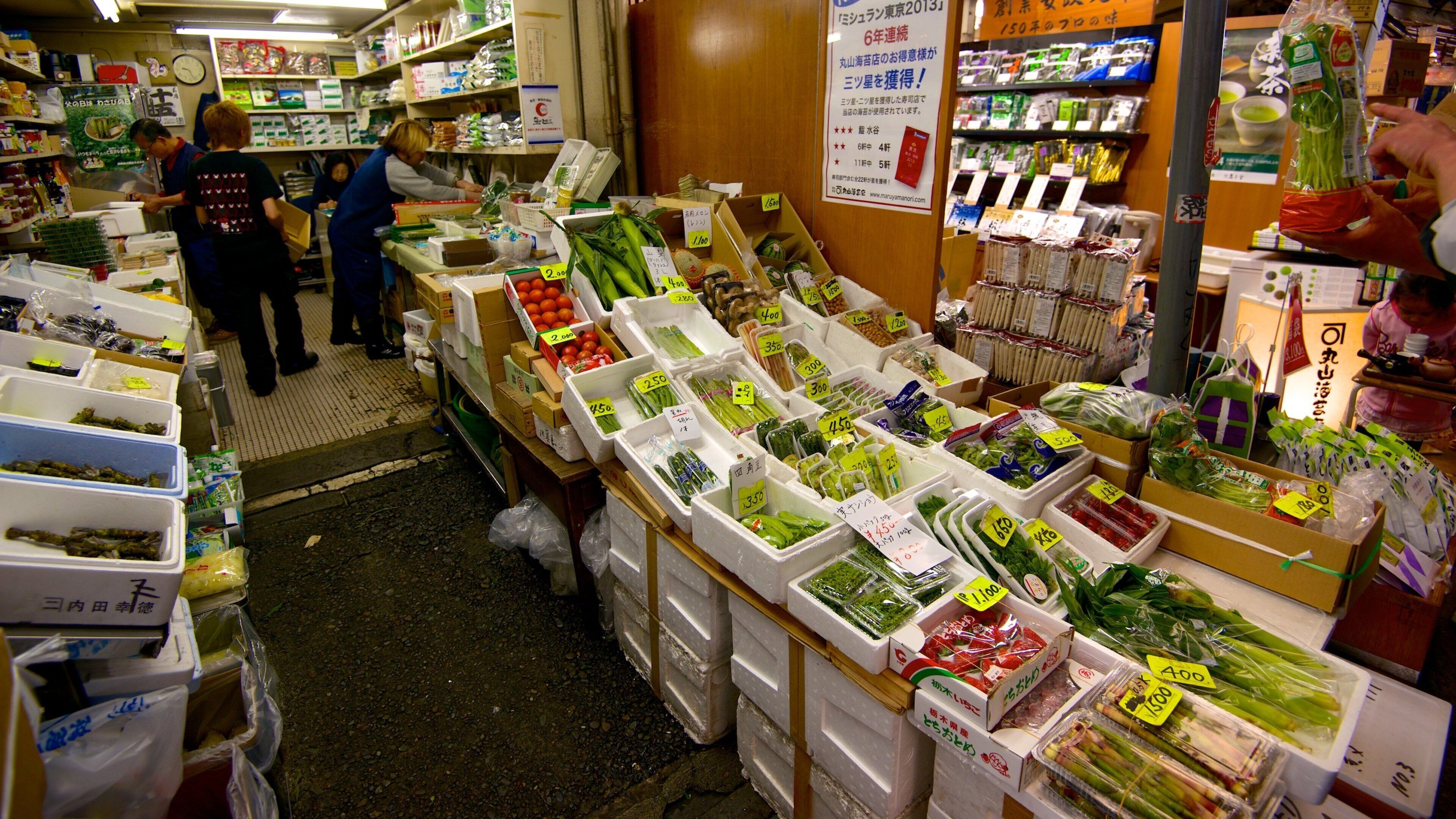 Tsukiji Fish Market showing interior views, markets and food