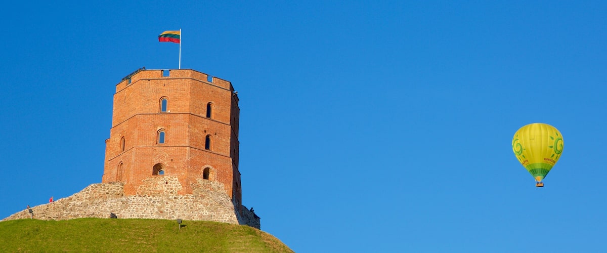 Gediminas Tower which includes ballooning, a castle and heritage architecture