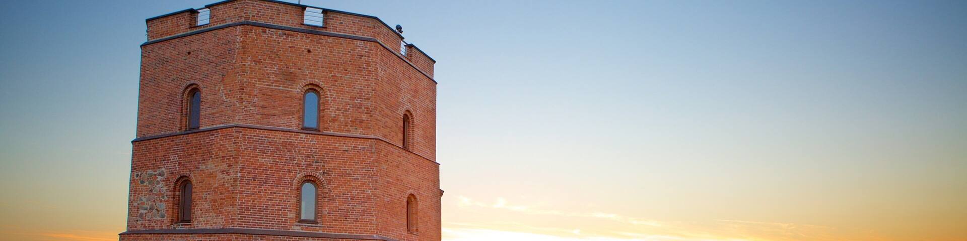 Gediminas Tower which includes a sunset and a castle