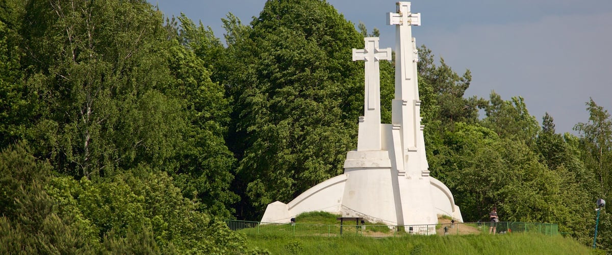 Three Crosses which includes religious aspects, a garden and a monument