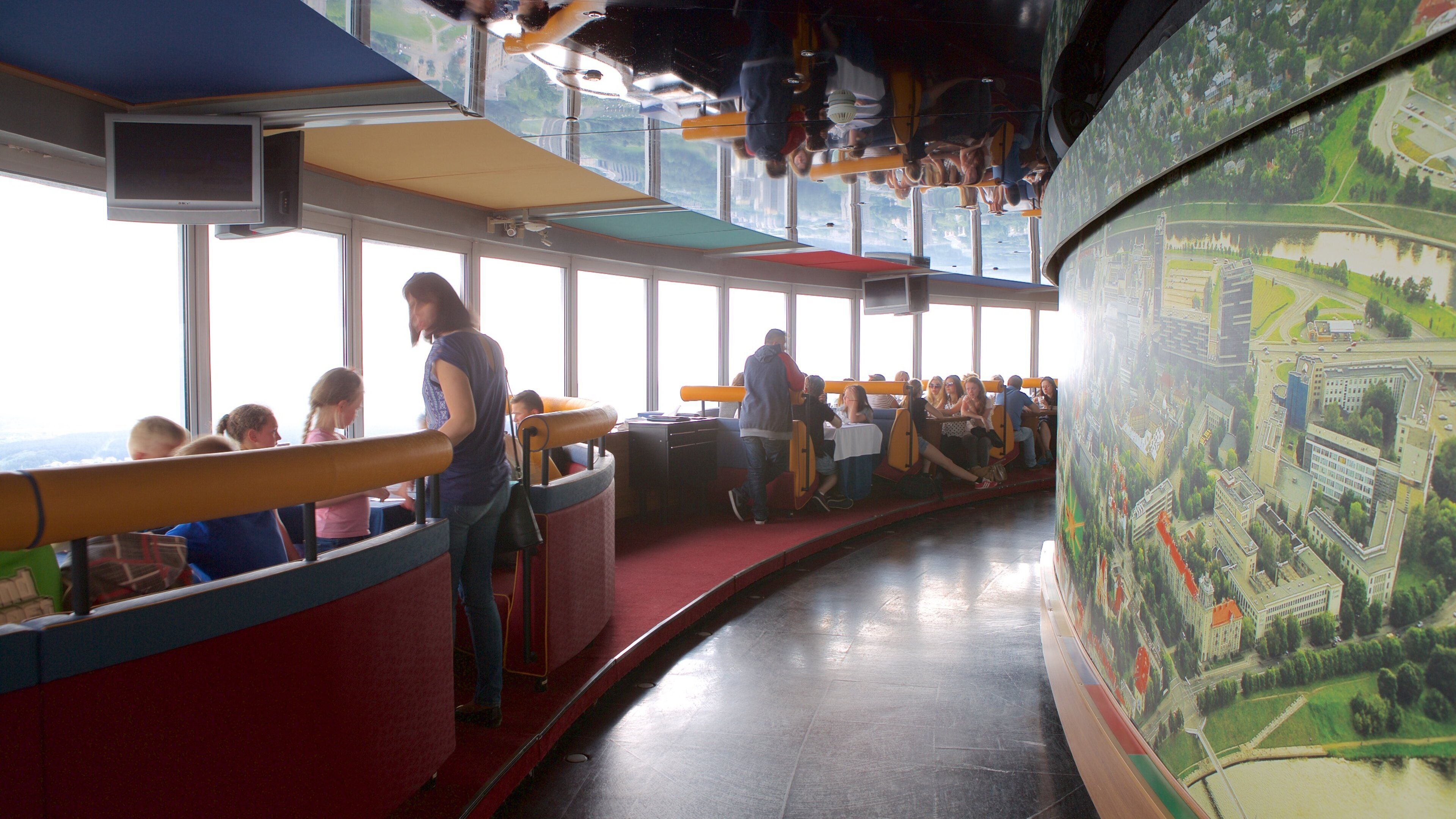Vilnius TV Tower showing dining out and interior views as well as a small group of people