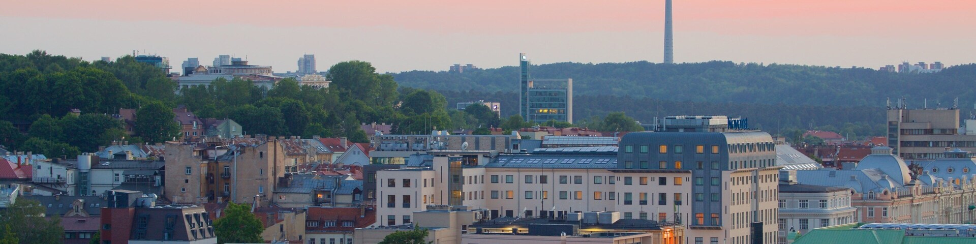 Vilnius TV Tower featuring a sunset