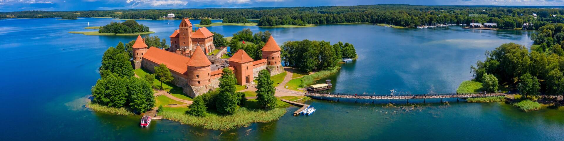Aerial view of Trakai, over medieval gothic Island castle in Galve lake. Flat lay of the most beautiful Lithuanian landmark. Trakai Island Castle, most popular tourist destination in Lithuania