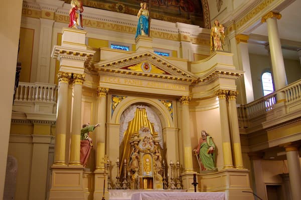 Saint Louis Cathedral featuring a church or cathedral, religious aspects and interior views
