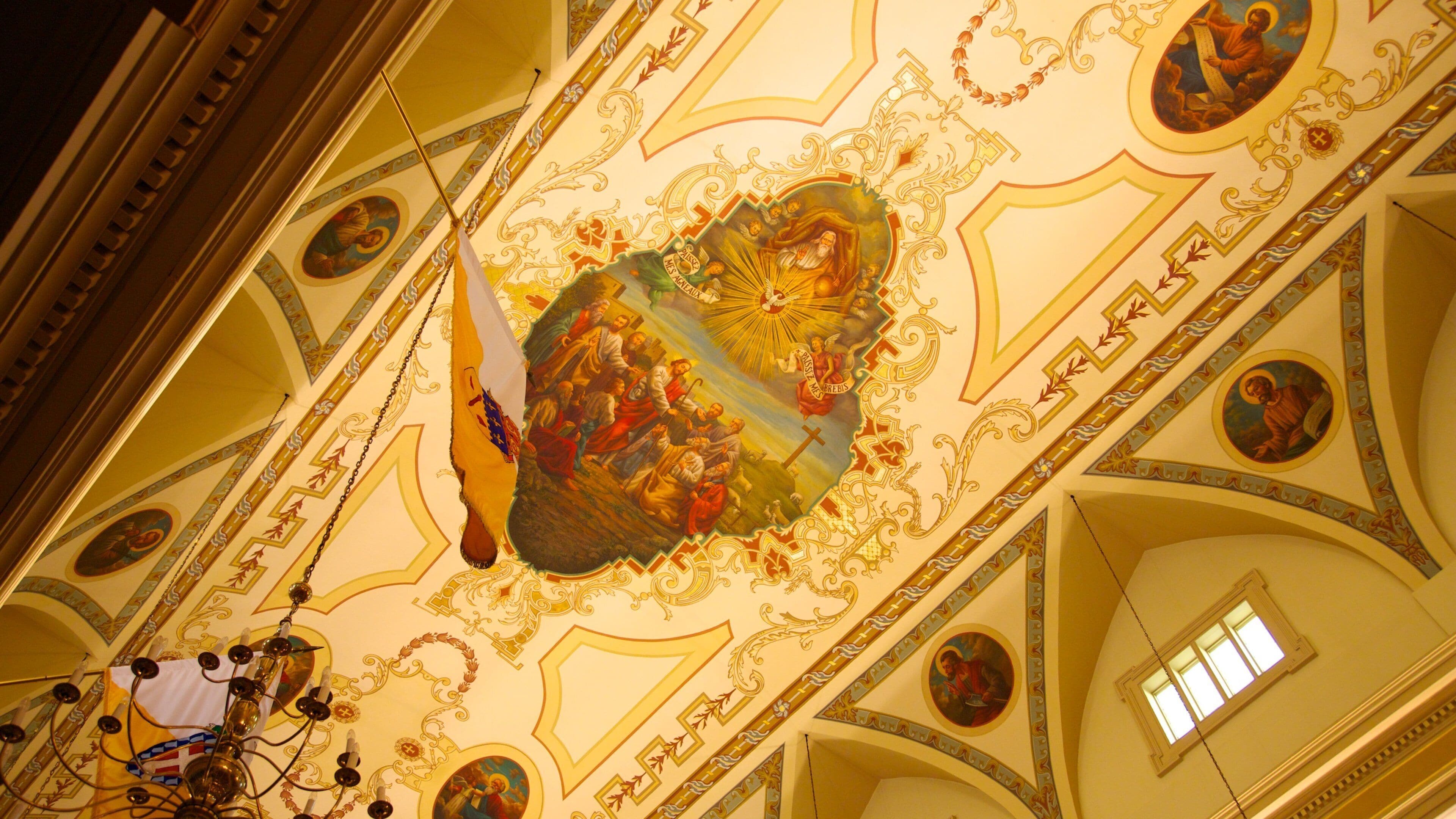 Stunning interior view of Saint Louis Cathedral showcasing intricate ceiling artwork in New Orleans, Louisiana