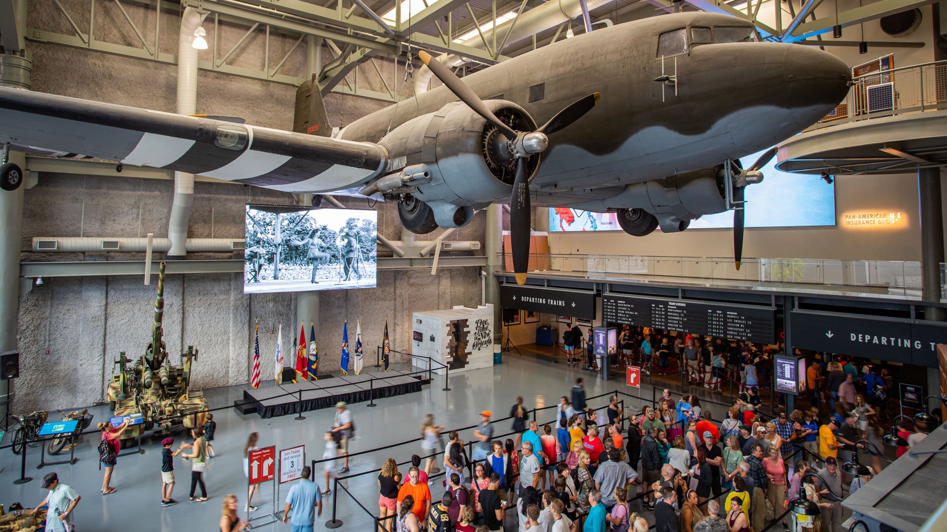 National World War II Museum featuring interior views as well as a large group of people