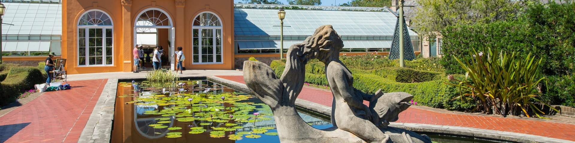 New Orleans Botanical Garden which includes a park, a statue or sculpture and a pond