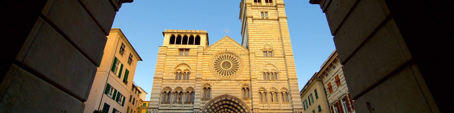 A historic church with a prominent clock tower and intricate facade.