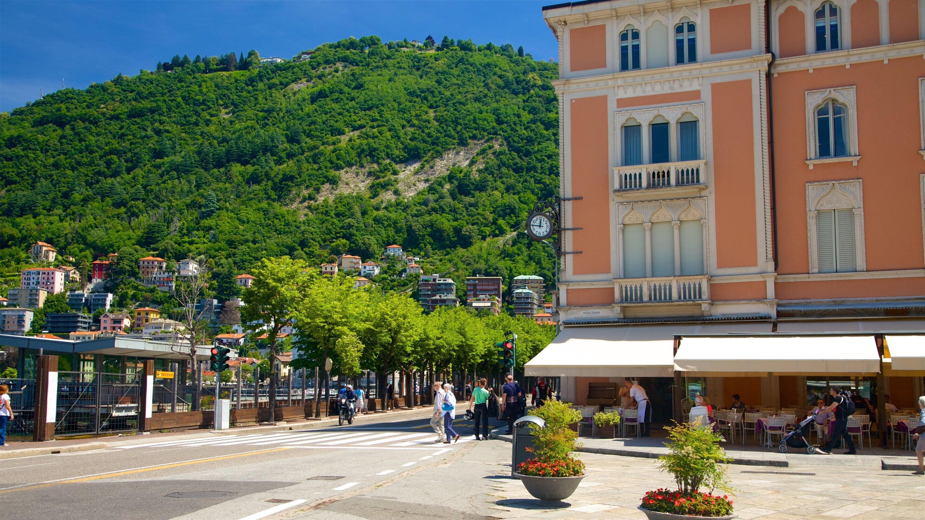 Piazza Cavour featuring a small town or village, a square or plaza and heritage architecture