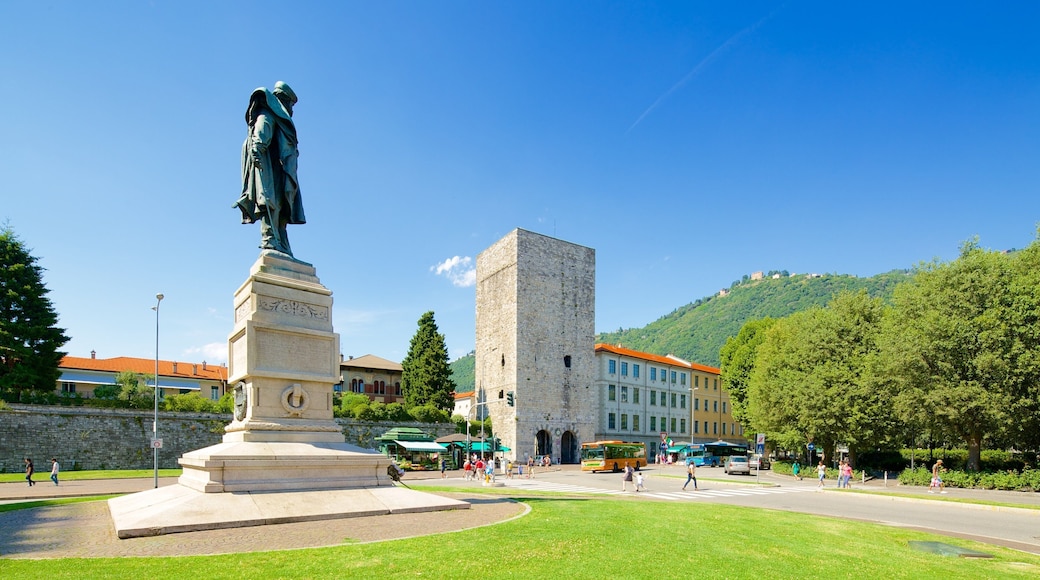 Piazza Vittoria which includes a square or plaza, a statue or sculpture and a monument