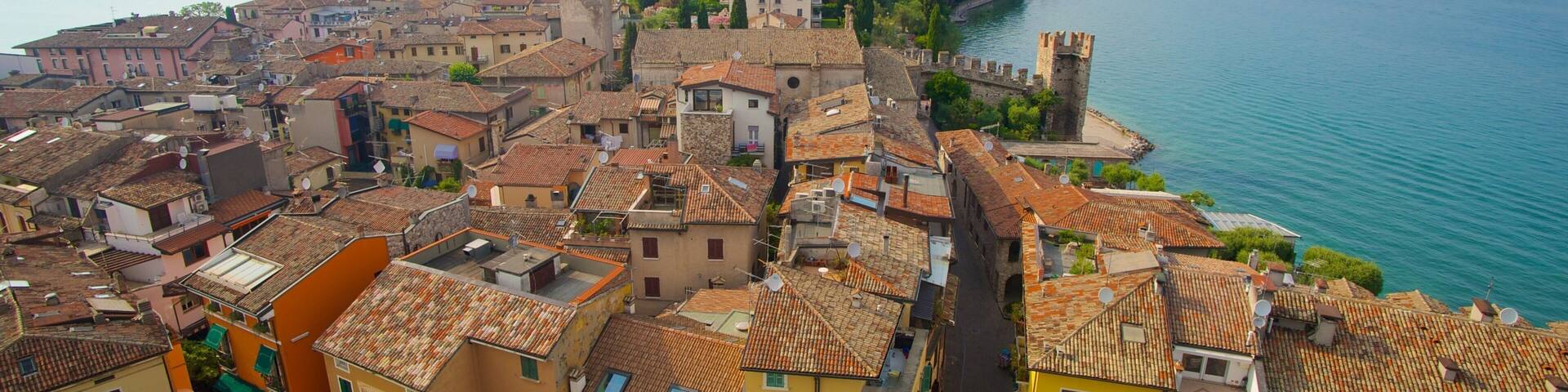 Scaliger Castle which includes a lake or waterhole and a city