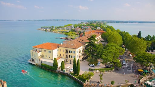 Scaliger Castle which includes a small town or village and a lake or waterhole