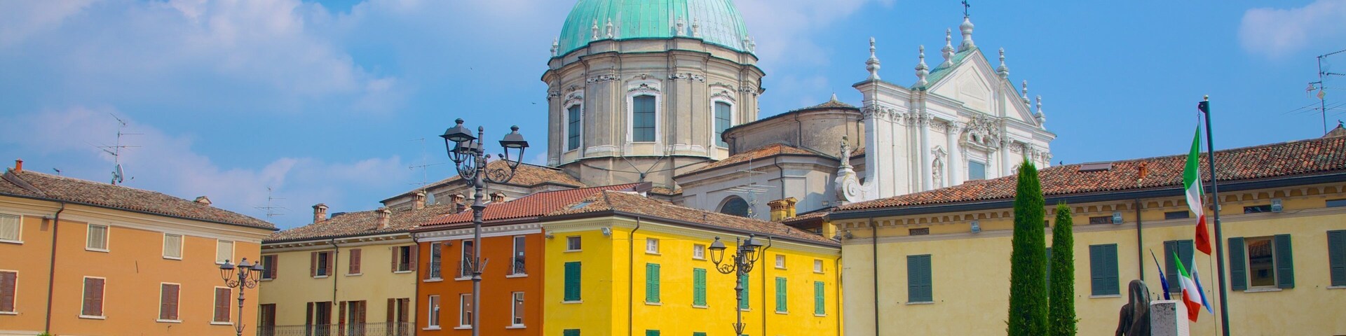 Cathedral of San Giovanni Battista showing a square or plaza, a city and a church or cathedral
