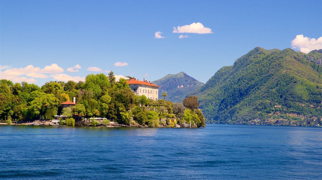 Isola Madre Botanical Garden featuring a small town or village, a lake or waterhole and mountains