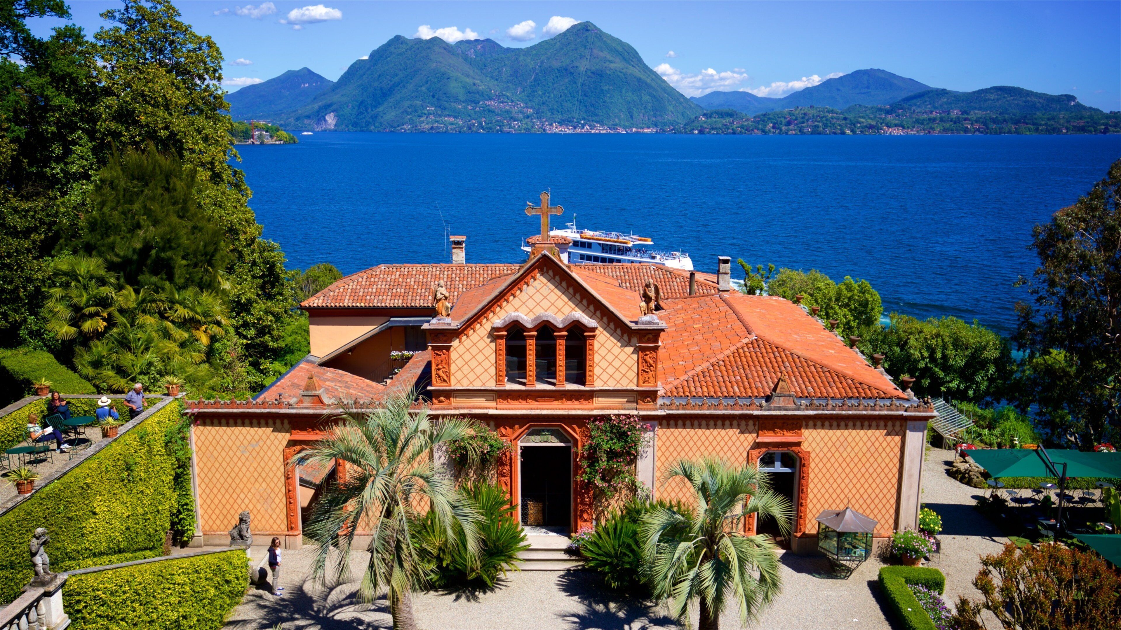 Isola Madre Botanical Garden featuring a lake or waterhole, heritage elements and religious aspects