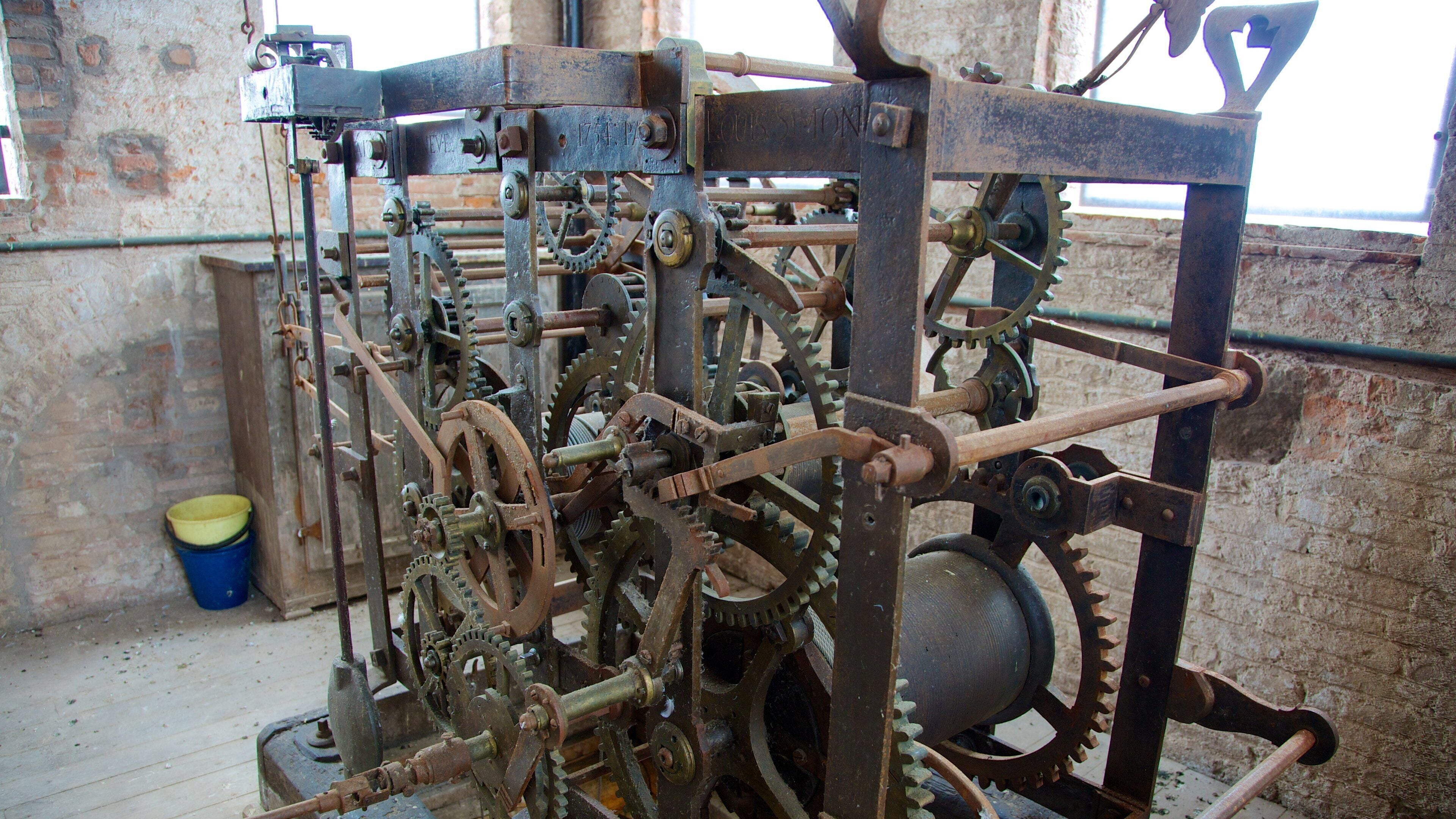 Torre delle Ore which includes heritage architecture and interior views