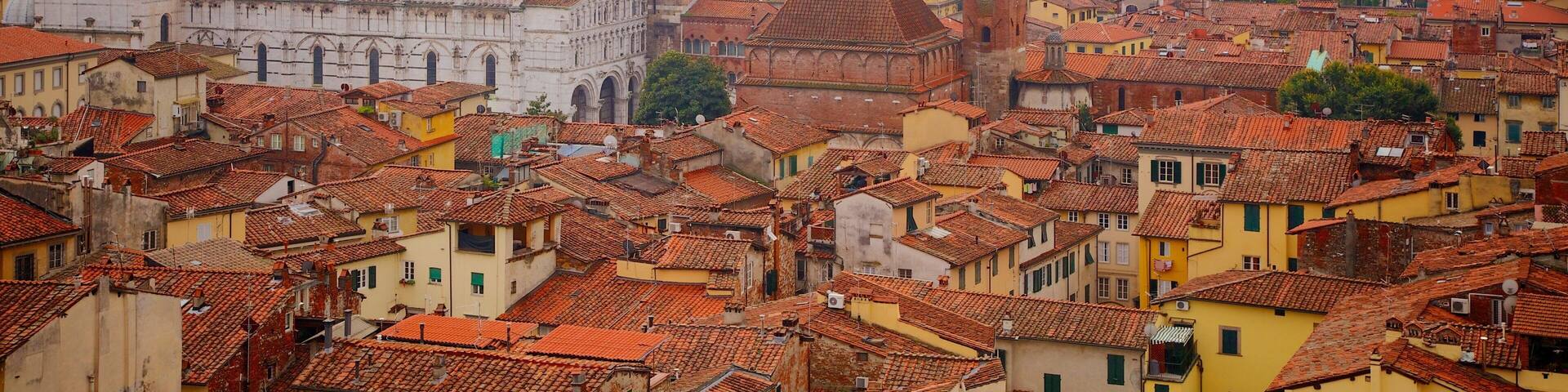Torre delle Ore featuring heritage architecture and a city