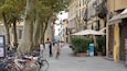 Piazza Napoleone showing heritage architecture, a city and road cycling
