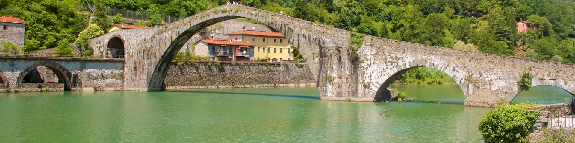 Ponte della Maddalena which includes a bridge and a lake or waterhole