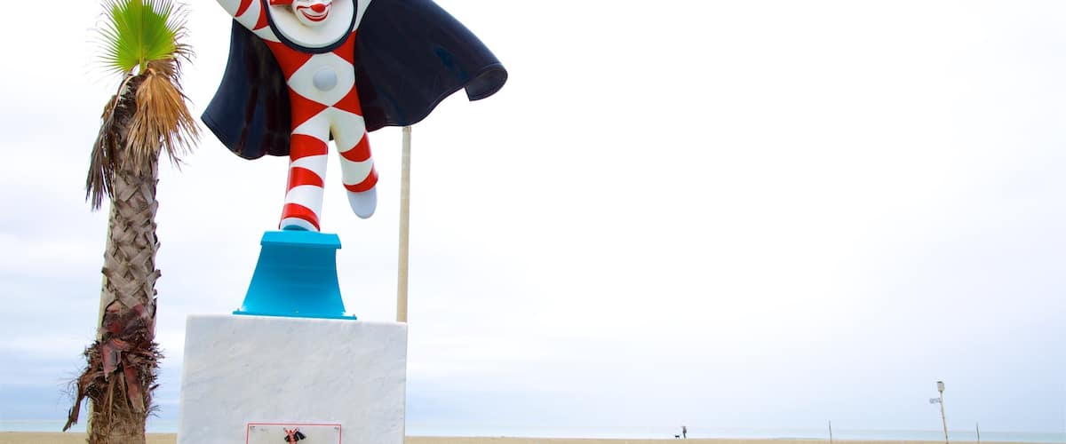 Statue of Burlamacco which includes a statue or sculpture and a sandy beach