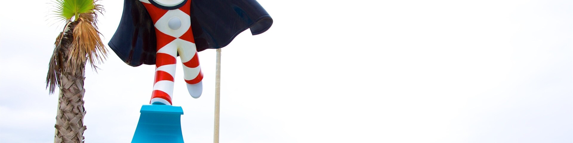 Statue of Burlamacco which includes a statue or sculpture and a sandy beach