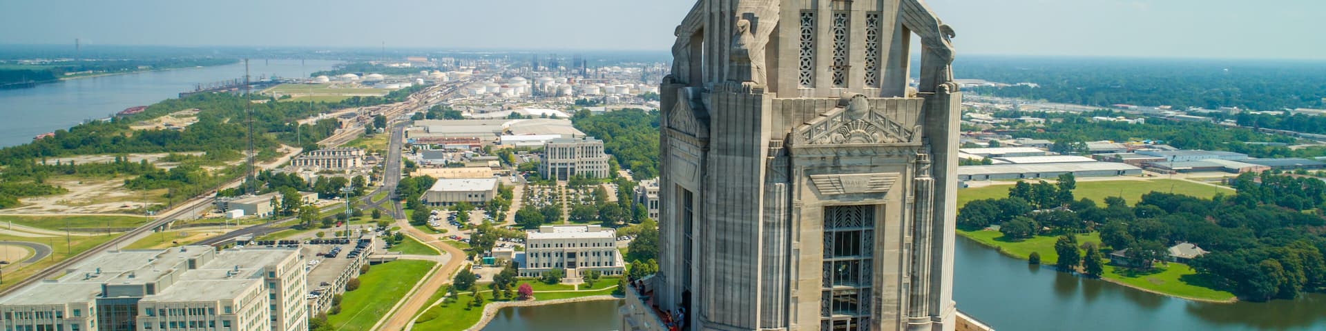 Aerial closeup of the Louisiana State Capitol Building and welcome center in Baton Rouge