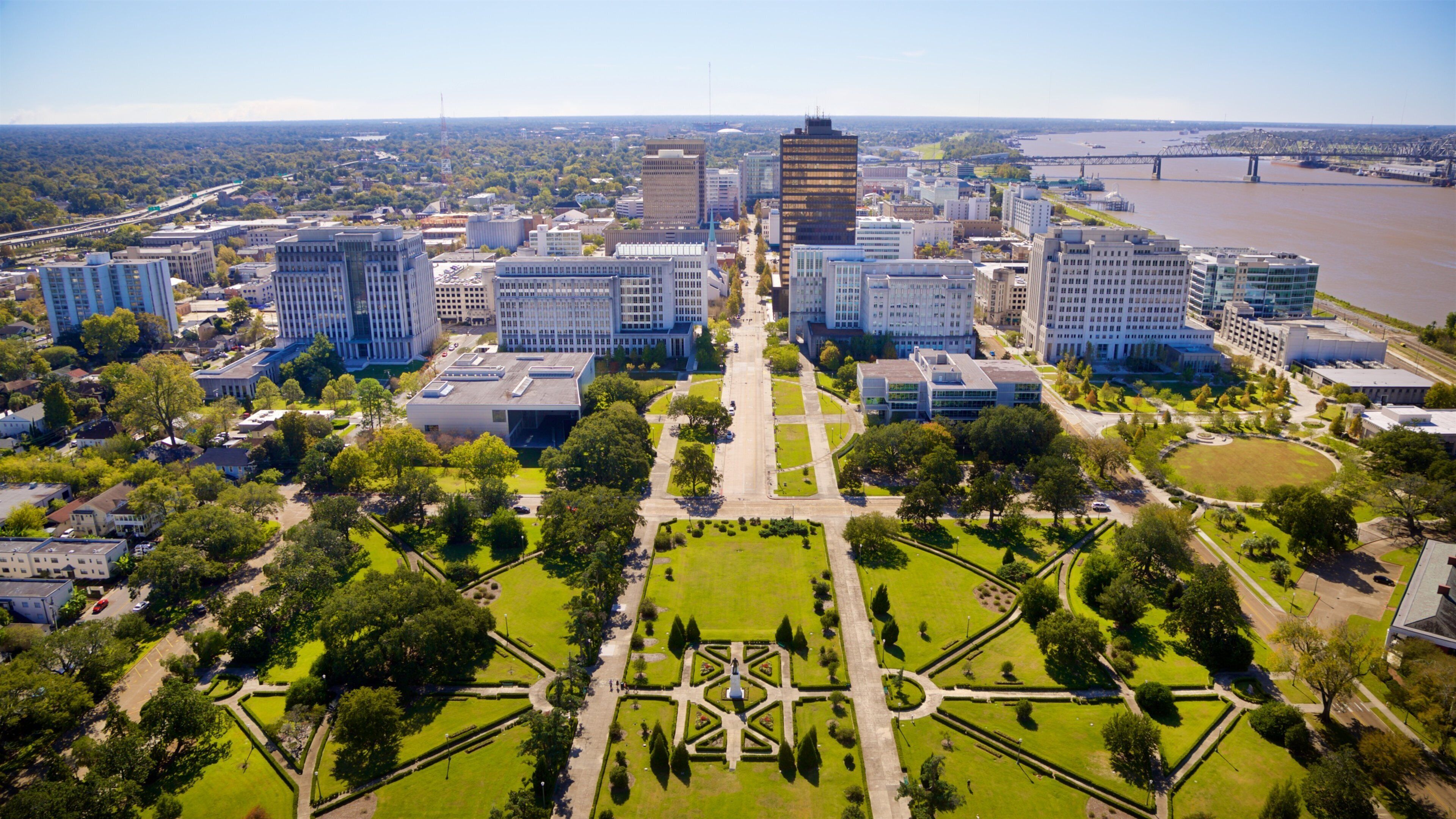 Louisiana State Capitol showing landscape views and a city