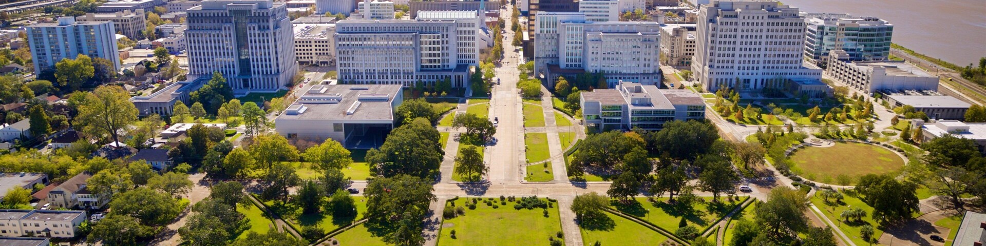 Louisiana State Capitol showing landscape views and a city