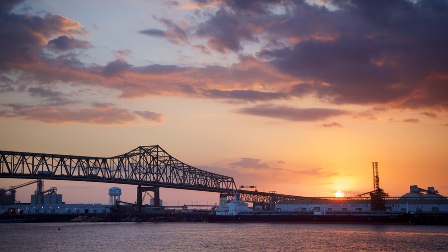 Howard Wilkinson Bridge showing a river or creek, a sunset and a bridge