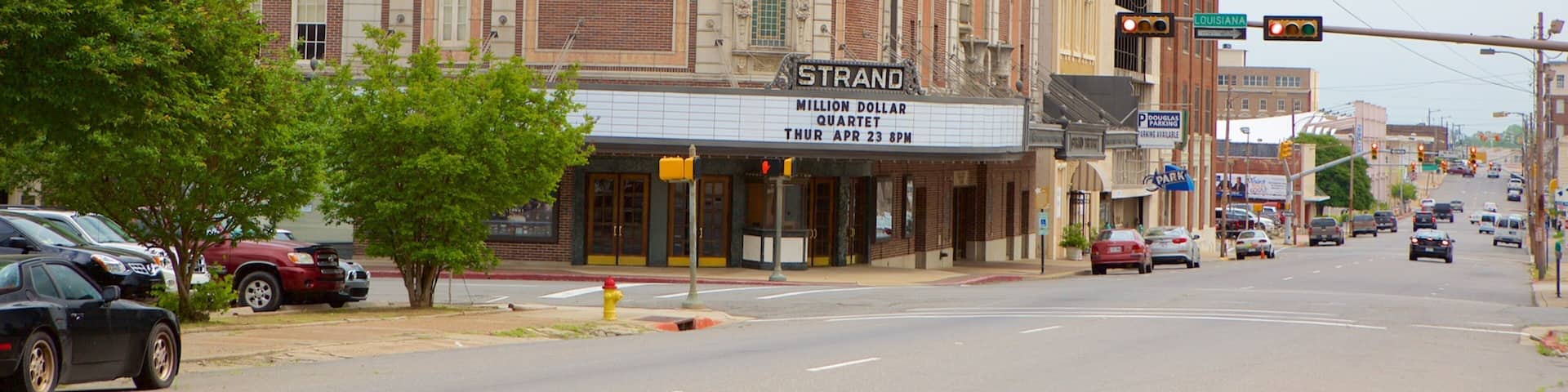 Strand Theatre which includes theater scenes, street scenes and heritage architecture