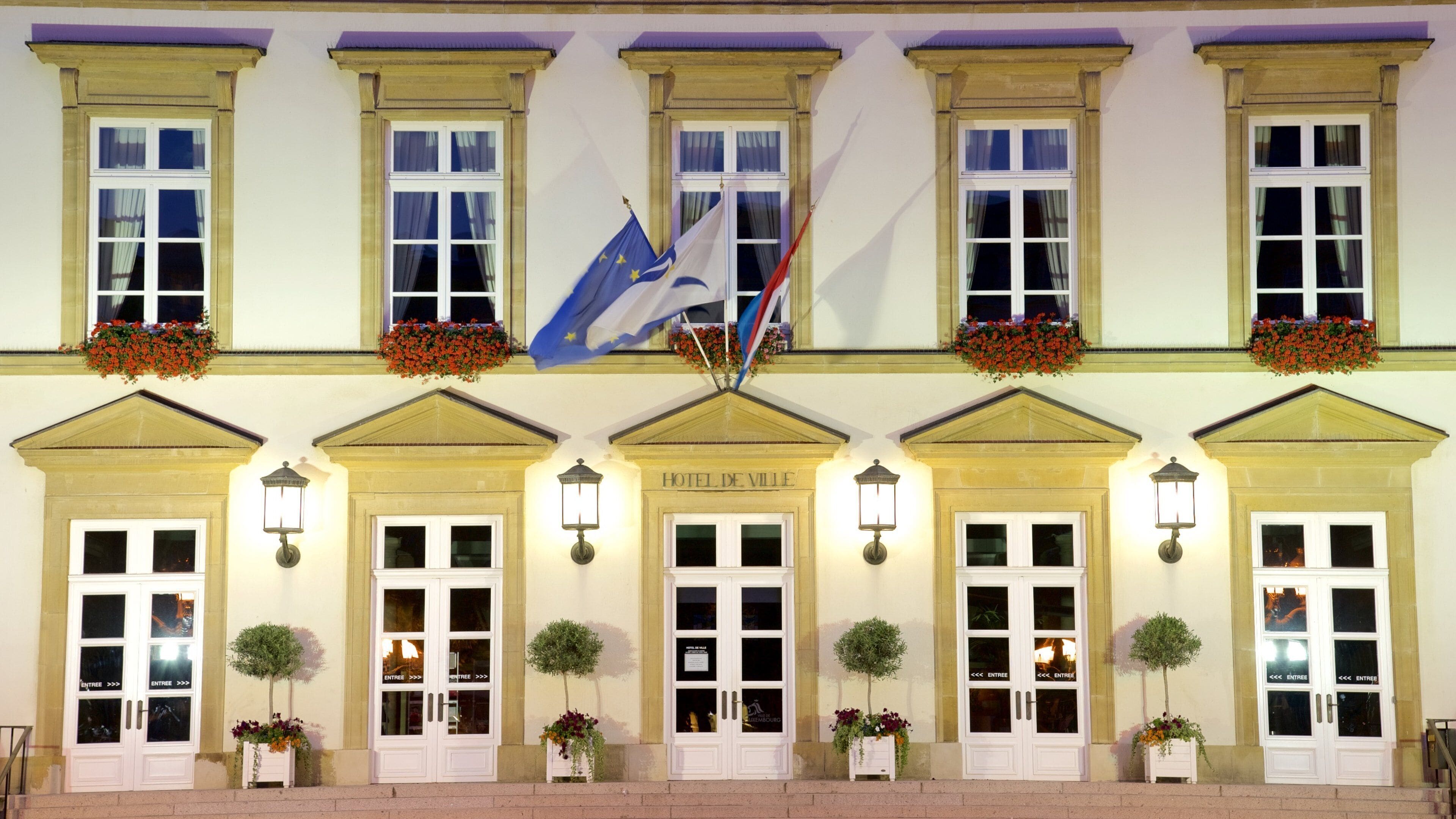 Luxembourg City Hall featuring heritage elements, an administrative building and night scenes