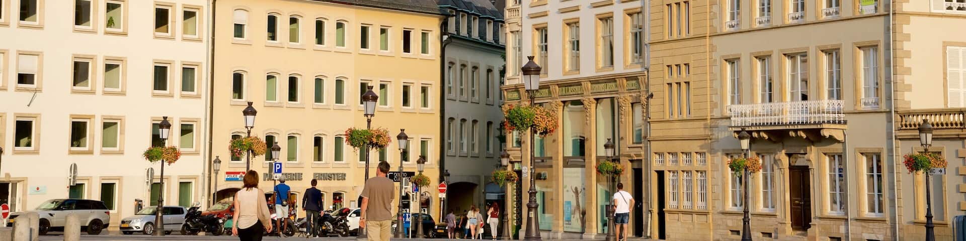 Luxembourg featuring heritage architecture and a square or plaza as well as a small group of people